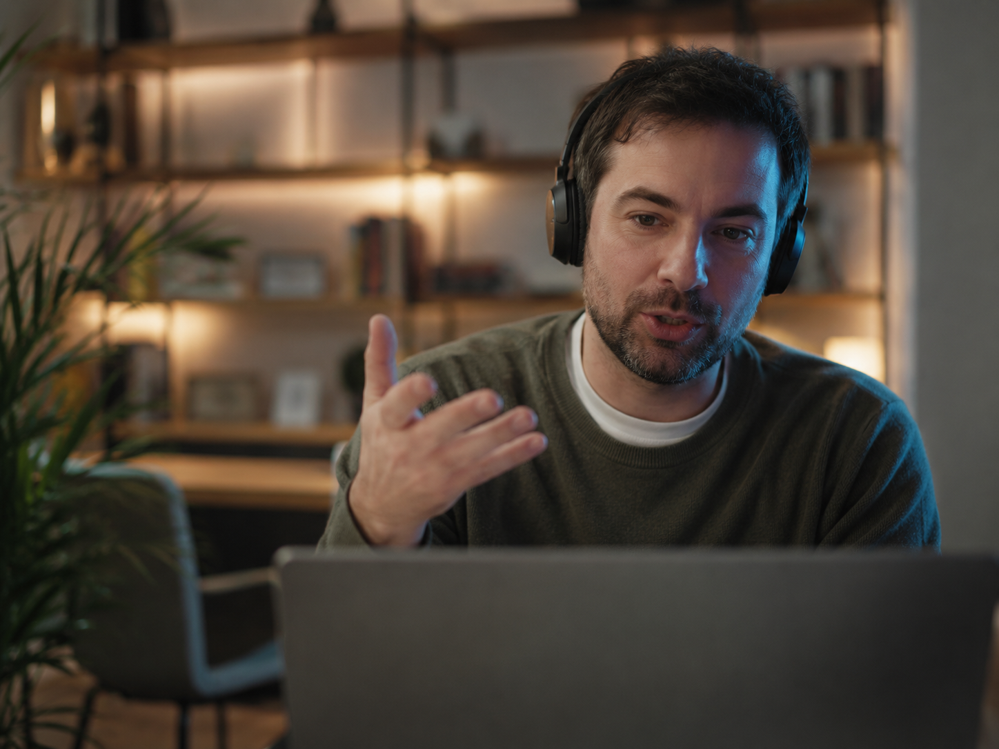 Candidate wearing headphones, speaking through a live voice interview